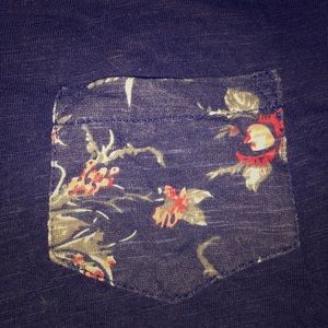 Rue 21 half sleeve shirt with floral accents.